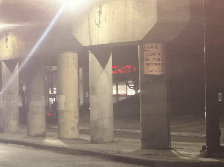 Image of intersection with no camping sign